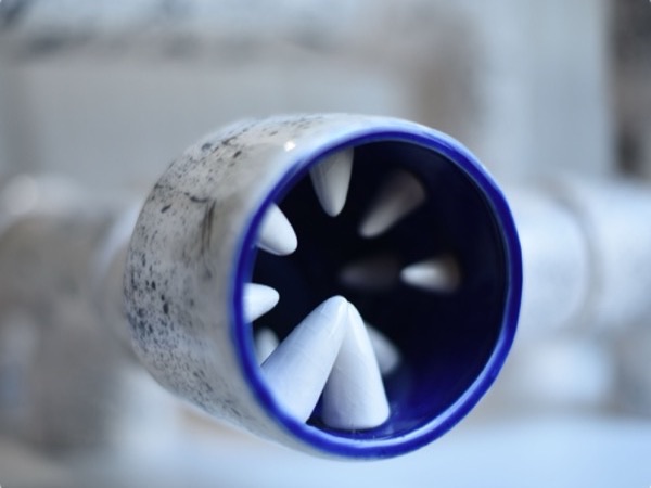 Urban Lion, a glazed ceramic pipe form